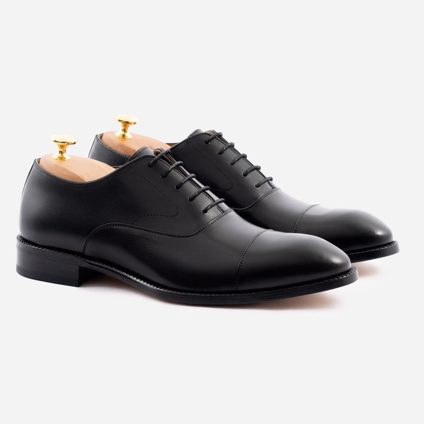 Business Setting with Black Oxfords